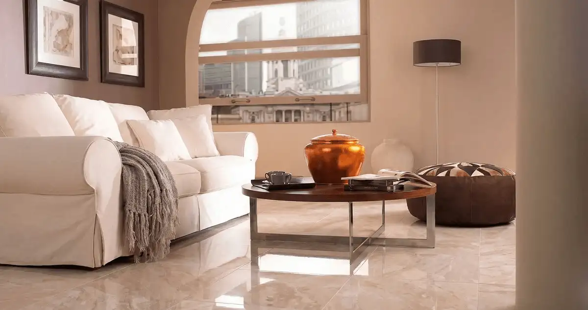 Modern living room with professionally installed marble flooring, a beige sofa, coffee table in Charlotte, NC