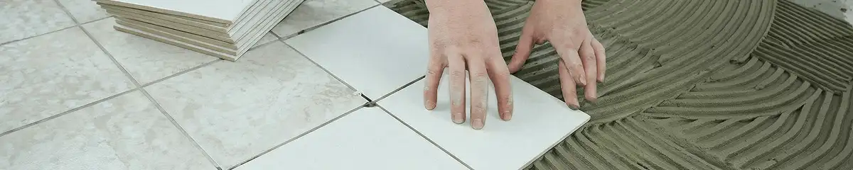 Professional installing white tile floors in Charlotte, NC